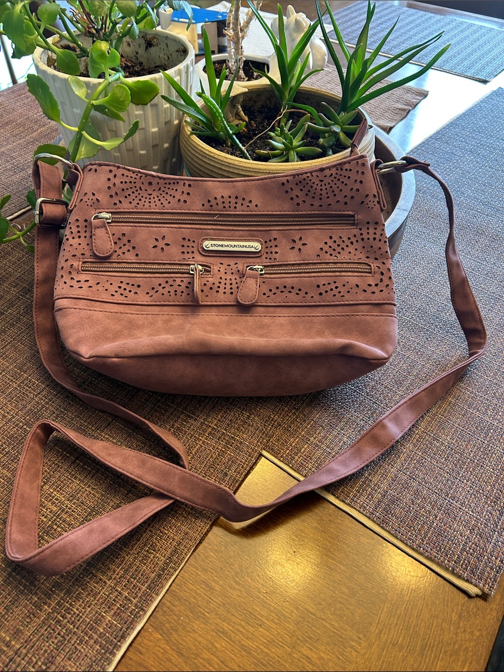 Stone Mountain Accessories Mauve Faux-Suede Crossbody with Laser-Cut Detail